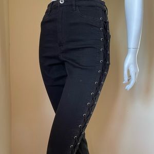 Laced-up black skinny stretch pants